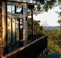 Rainforest Gardens - Luxury Hillside Chalets with Views to Bay  Islands - Accommodation in Surfers Paradise