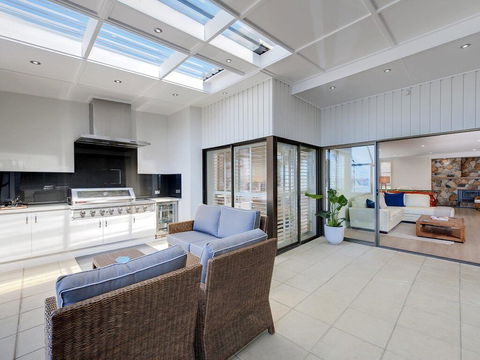 Whispering Sands', 10 Sandy Point Road - Luxury Waterfront Home With Aircon, WIFI & Foxtel - Accommodation in Surfers Paradise 0